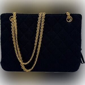 Chanel by Karl Lagerfeld quilted navy blue tweed shoulder bag.